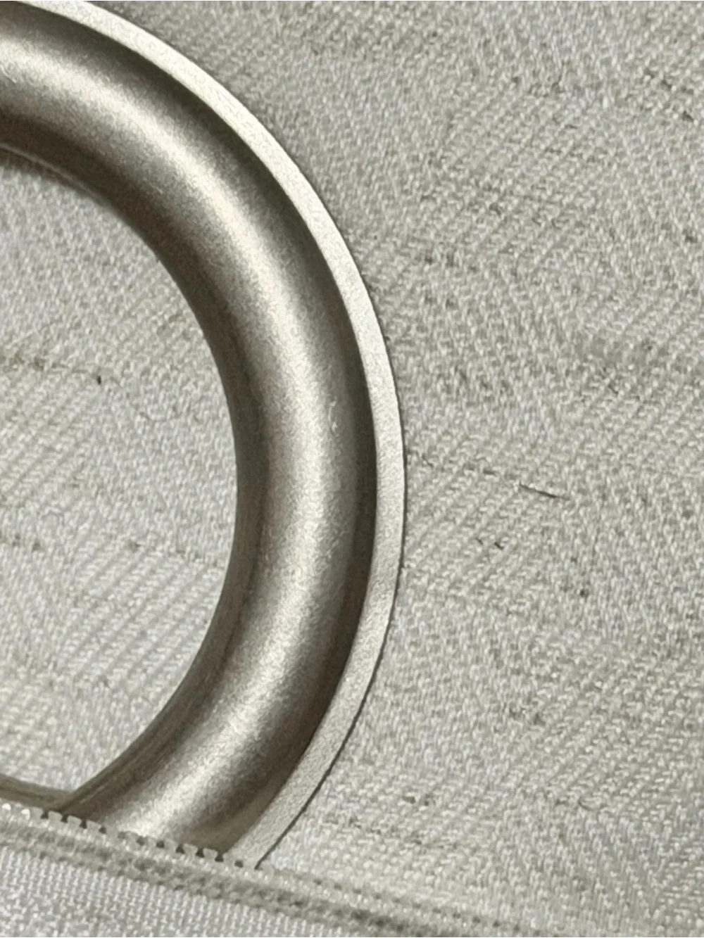 Two Safavieh Ivory Textured Silver Grommet Blackout Window Panels